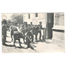 The assassin was caught and took to the police station