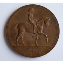 Portrét Franz Josefa na koni na bronzové medaili