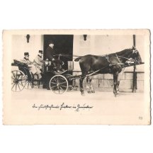 Franz Josef ridding in coach around town