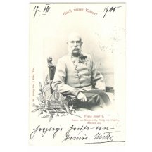 Sedící František Josef v křesle, před ním je královská koruna